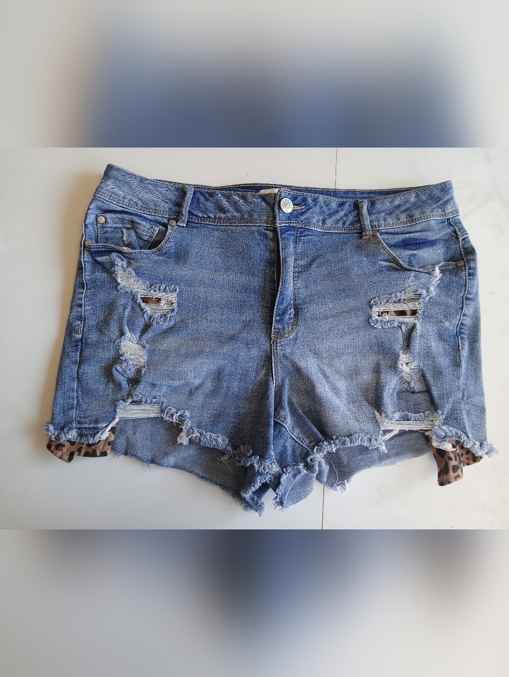Ripped Mid-Rise Denim Shorts in Blue with Leopard Trim